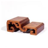 UNUSUAL CHINESE ROSEWOOD TIERED TABLE STAND | 20th century, with archaistic scrollwork design h. 4-1