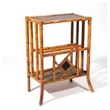 ENGLISH JAPONAISE LACQUERED BAMBOO SIDE TABLE | Late 19th century, the top decorated with a bird and