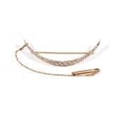 14K CRESCENT MOON-SHAPED DIAMOND PIN | Having 23 full-cut melee diamonds, ranging 0.02-.015 ct, appr