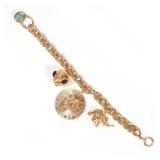 14K CHARM BRACELET WITH CHARMS | Oversized rolo link 14k yellow gold bracelet with four charms, incl