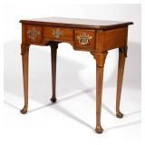19TH CENTURY GEORGIAN MAHOGANY LOWBOY | Top with notched corners, three frieze drawers, resting on s
