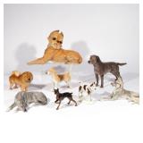(8PC) NYMPHENBERG PORCELAIN DOG FIGURINES | Of varying sizes and breeds. h. 8-1/4 w. 14-1/2 d. 5-1/2