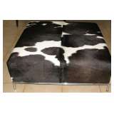Black and White Cowhide Ottoman
