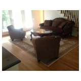 Leather and upholstered sofa and 2 choc brown upholstered chairs