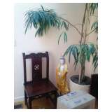 SCULPTURE, PLANT AND ORNATE WOOD CHAIR