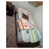 Twin Bed, Quilts, Towels, Wood Storage Shelf