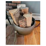 brass pot with fireplace wood