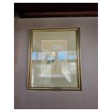 Framed art work of a flower
