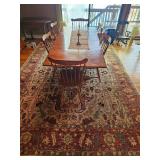 Large farm style wooden table and 6 chairs, Vintage oriental fringed rug, Brass candle sticks