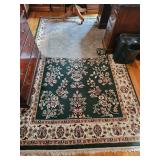 Oriental Emerald green fringed rug, Wooden desk, Wooden chest of draws