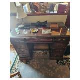 Old wooden desk with protective glass top, Men