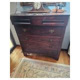 Vintage dresser or chest of draws, mantle clock, mini sewing machine, Oriental rug with fringe 