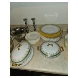 Covered vegetable bowls, matching china plates, candle sticks