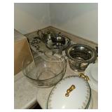 Silver bowls and creamer, glass mixing bowl, covered vegetable bowl