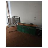Folding chairs, boat oars, wooden chest