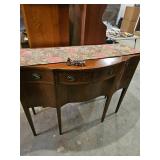 Mahogany Side Board with a Bow Front