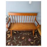 Wooden Bench, Brown rug with greenery