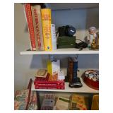 Nikon camera, Thread, Granny statue, Sewing basket with handle, cook books