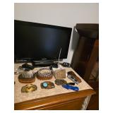 Belt buckles, knives, Phillips tv