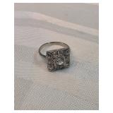 14k Gold With 1 Larger And 10 Smaller Diamonds