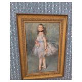 Golden framed artwork of a ballerina 