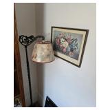 Floor lamp with floral shade, framed flower artwork