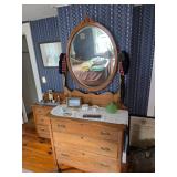Wooden dresser with oval mirror, doily, Green glass,