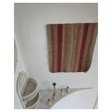 Silver candle sticks, wicker two tier shelf, wall hanging