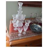 Wine decanter and matching glasses, Carnival glass, candle sticks