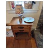 Side table, lamp filled with sewing thread, plate