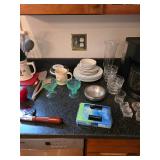 Sponges, mug, silver bowl, heavy duty pizza cutter, Green glass stemware, Severing Untesils