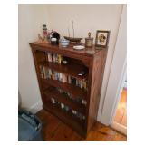 book case with books, Light house, trinket men playing chess,Blue & White bowl rice bowl, captains s