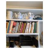 Teapots blue and white, cookbooks, mantle mount matches