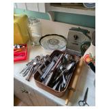 Rolling pin, silverware, glass beverage server, can opener, bread box