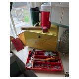 Bread box, assorted silverware , thermos, Old thermometer 