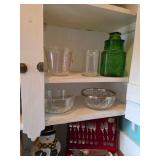 Green glass cookie jar, glass bowl with silver, silverware with case, pyrex measuring cup