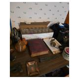 Thermos, camera bag, drinking glasses, old coffee can, copper ashtray, African calabash gourd