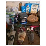 Assorted light bulbs, toy, Polaroid, Heating pad, baseball glove