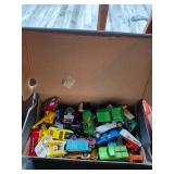 Small toy cars and trucks