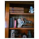 Beer steins, metal horse, figurine, books
