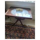 Wooden table with removable glass top, oriental rug