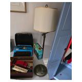 typewriter, floor lamp, toy trucks