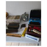 toy trucks, books, typewriter, US Navy battle lantern