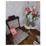 Victorian parlor side chair, small side table, floral arrangement