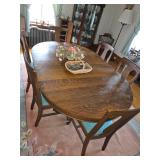Vintage Tiger oak dining table set with 6 matching chairs