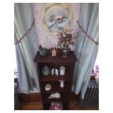 Small book shelf, trinkets, floral arrangement, winter wall art