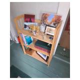 Wooden shelf or book case, artwork, books