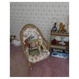 Wicker chair with pad, books, small bookshelf, welcome sign, Star Wars toy