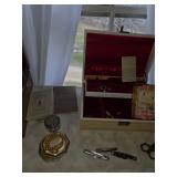 Assorted bibles, small knives