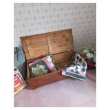 wooden trunk, quilts